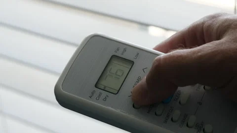 Turning Down Temperature on Thermostat in Summer in Hot Weather. Setting Di.. Stock Footage 312121312