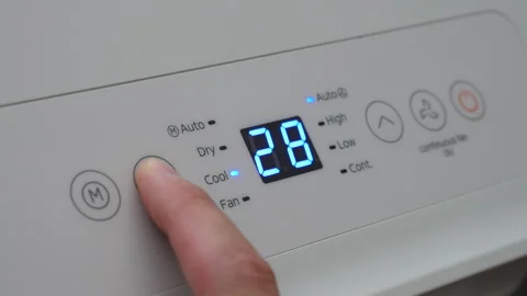 Turning Down Temperature on Thermostat in Summer in Hot Weather. Setting Di.. Stock Footage 312573849