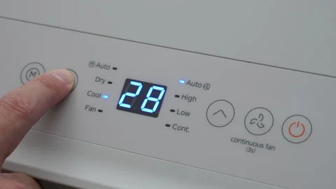 Turning Down Temperature on Thermostat in Summer in Hot Weather. Setting Di.. Stock Footage 312573947