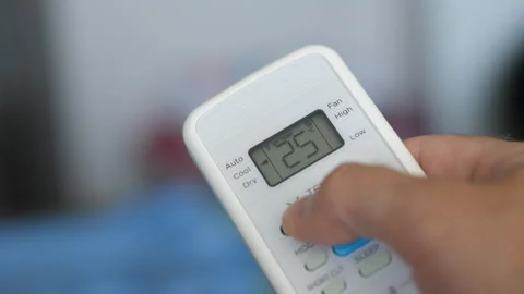 Turning Down Temperature on Thermostat in Summer in Hot Weather. Setting Di.. Stock Footage 312574045