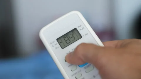 Turning Down Temperature on Thermostat in Summer in Hot Weather. Setting Di.. Stock Footage 331996721