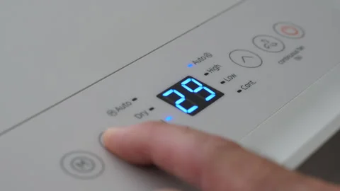 Turning Down Temperature on Thermostat in Summer in Hot Weather. Setting Di.. Stock Footage 337795280