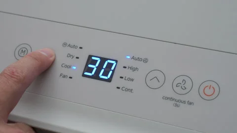 Turning Down Temperature on Thermostat in Summer in Hot Weather. Setting Di.. Stock Footage 337797503