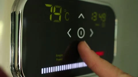 Turning down the temperature. Touch panel closeup. Vídeo Stock 50902266