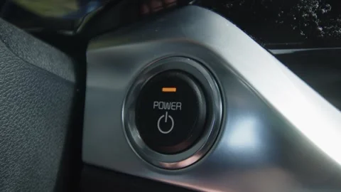 turning on electric car with power butto... | Stock Video | Pond5