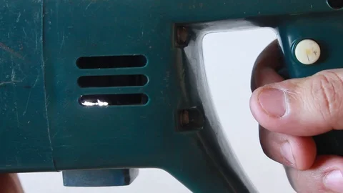 Turning on electric drills Stock Footage 107546917