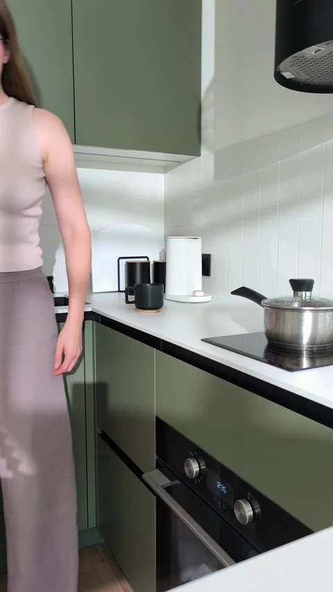 Turning on electric kettle to start a refreshing morning coffee routine. Yo.. Stock Footage 345553186