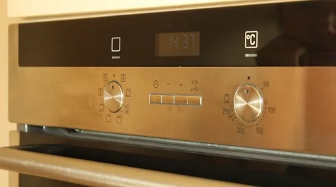 Turning On electric Stove Stock Footage 55512094