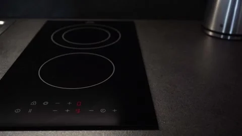 Turning on the electric stove Stock Footage 281600664
