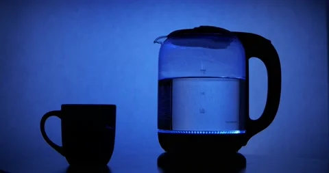 Turning on an Electric Tea Kettle Stock Footage 157742630