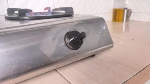 Turning on the gas stove in the kitchen Stock Footage 291969930