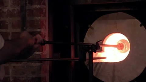 Turning Glass in Fire Stock Footage 7770403