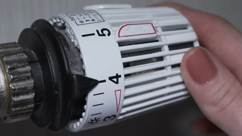 Turning off heating with regulator Stock Footage 146313126