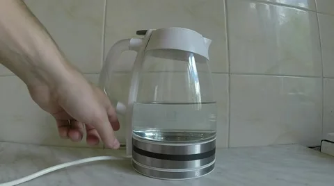 Turning on kettle Video stock 39959484