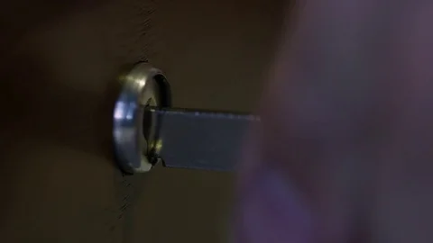 Turning a key closeup Stock Footage 82823999