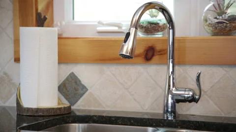 Turning on kitchen sink, high pressure Stock Footage 67275079