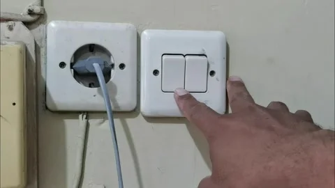 Turning on the lamps Stock Footage 294076024