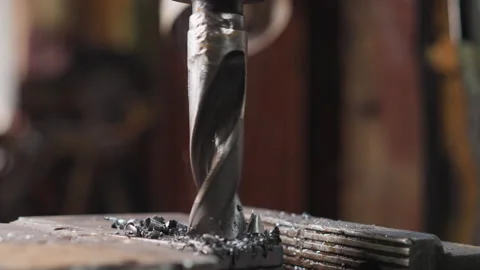 Turning lathe machine bit goes down into metal workpiece Stock Footage 243305710