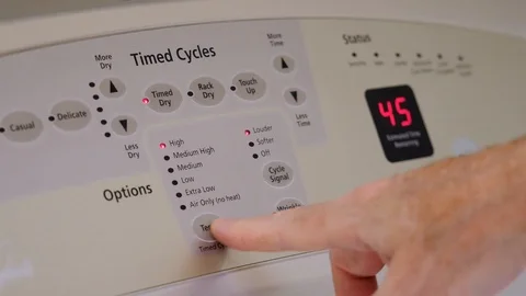 Turning on a laundry washing machine. Stock Footage 125480208