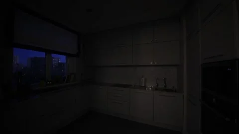 Turning light on and off in modern white kitchen in apartment Stock Footage 276364348