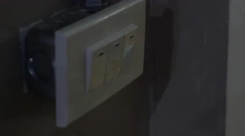 Turning Light Switch Stock Footage 62835101