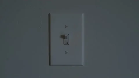 Turning on/off Light Switch-White Video stock 147884746