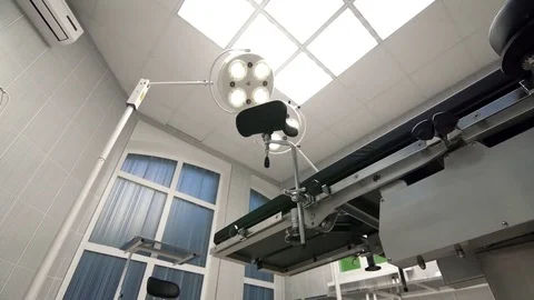 Turning Lights On in Operating Room background Stock Footage 83761832