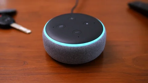 Turning On Lights with Small Smart Speaker Assistant and Voice Control Vídeo Stock 99734570
