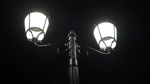 Turning on the lights on the streetlight Stock Footage 150747281