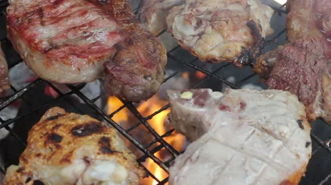 Turning meat on the Barbecue - Close Up Stock Footage 42685241