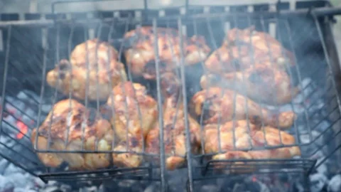 Turning the meat on the grill Stock Footage 91200521