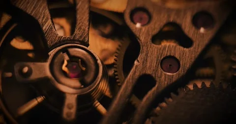 Turning metal gears and cogs inside a clock Stock Footage 337170354