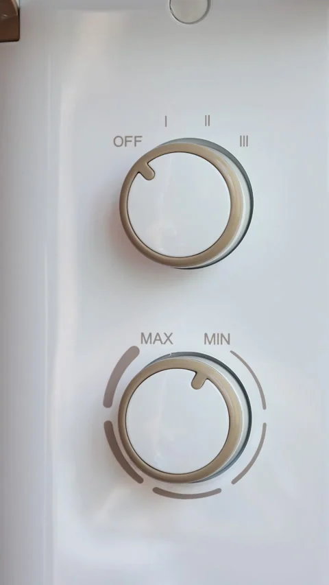 Turning Mode And Temperature Knobs On Electric Oil Heater Radiator. Vertical. Stock Footage 289302335