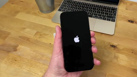 Turning on new Apple iPhone 14 Pro for the first time. Stock Footage 239643469