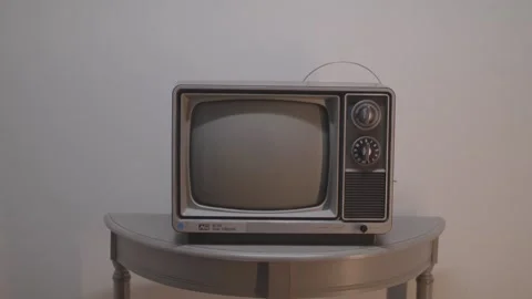 Turning an Old TV on and Off Stock Footage 171298426