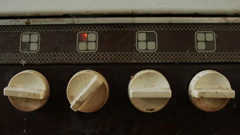 Turning on old type of stove 4K video Stock Footage 142474759
