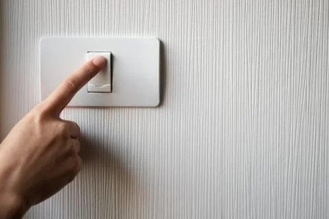 Turning on or off on light switch Stock Photos