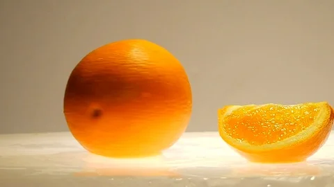 Turning orange fruit slow motion Stock Footage 87804876