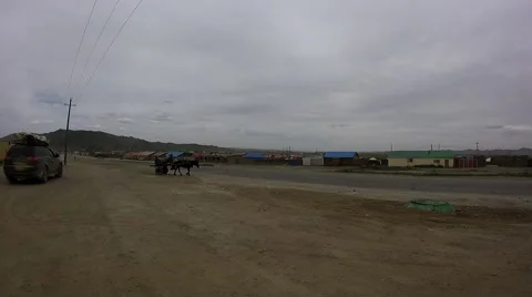 Turning Out Machine on Road on Background of Moving a Horse Stock Footage 62570935