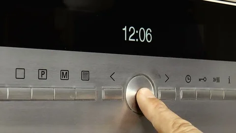 Turning on the oven Stock Footage 78303053
