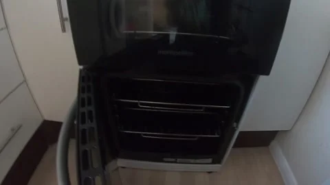 Turning On An Oven Stock Footage 137826953