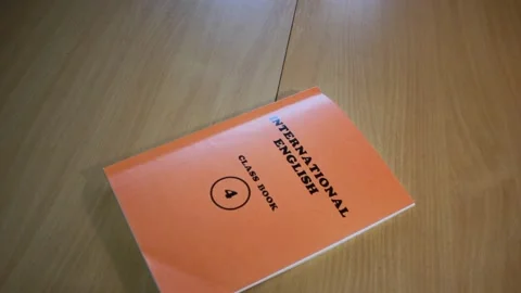 Turning over the pages of the book Stock Footage 131218484