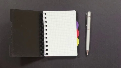 Turning over pages of notebook Stock Footage 71225223