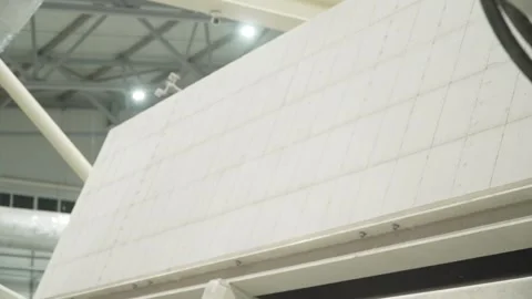 Turning over a stack of cut aerated concrete blocks Stock Footage 271194446