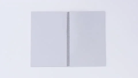 Turning page binder book by wind on a white background Stock Footage 162641442