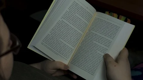 Turning a Page While Reading Video stock 127001922
