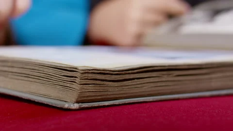 Turning the pages of an ancient book. Stock Footage 274844027