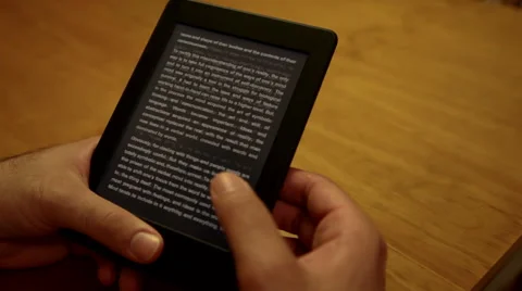 Turning Pages on E-Reader Stock Footage 45607136