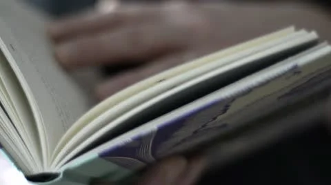 Turning pages Stock Footage 12591585