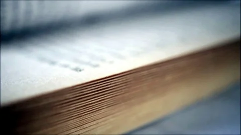 Turning the pages of old book. Video stock 122909170